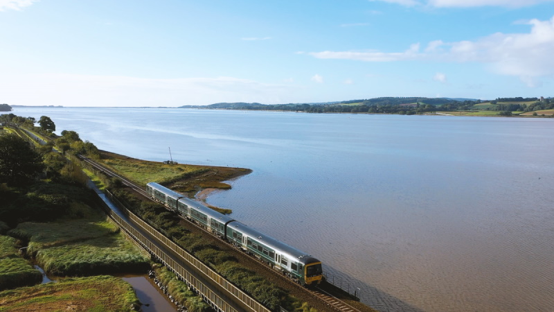 Train travelling alongside the River Exe Estuary